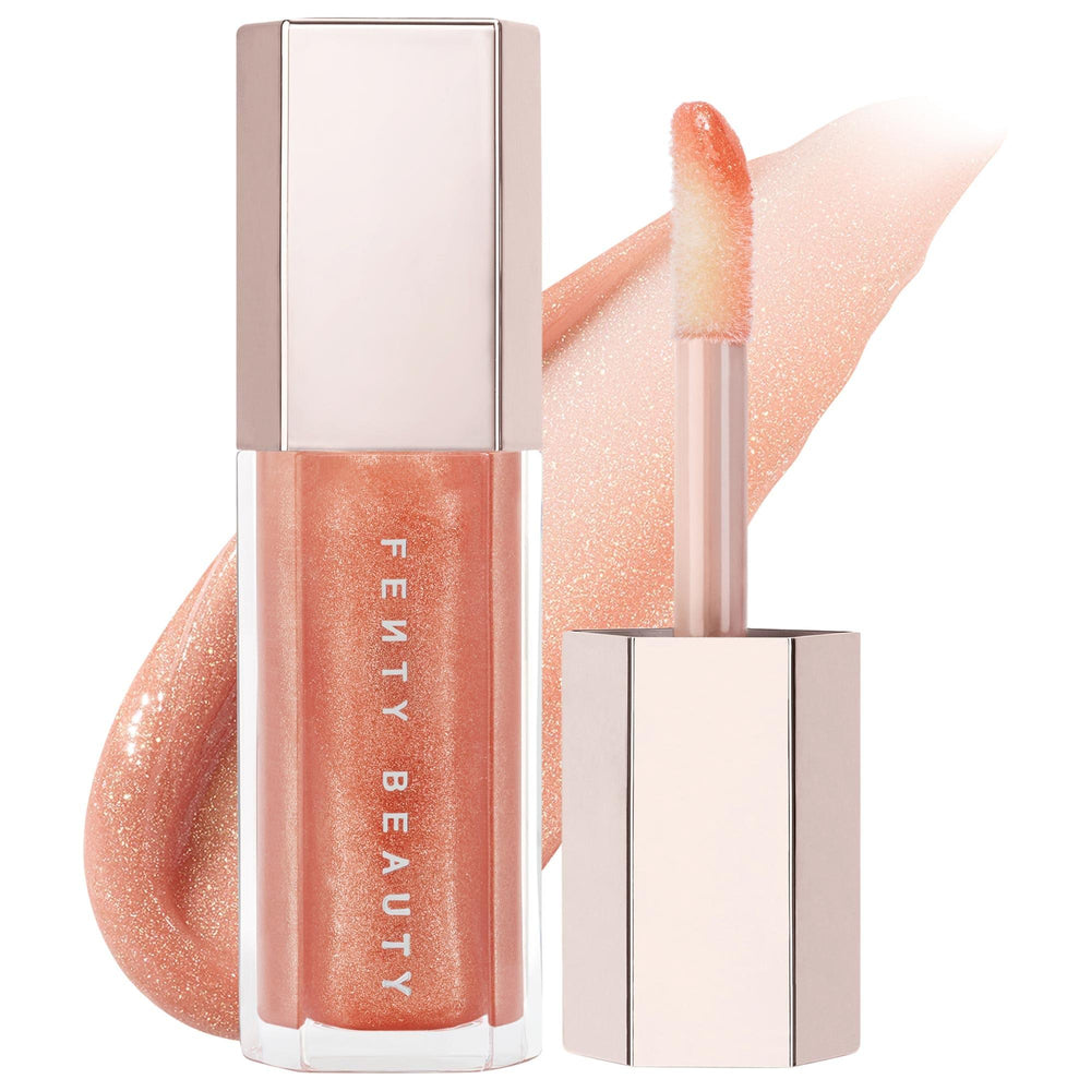 Fenty Beauty Gloss Bomb: Explosive Shine Lip Gloss - Hydrating, Non-Sticky Formula - Universal Luminizer for All Skin Tones Fenty Beauty Gloss Bomb: Explosive Shine & Hydration Lip Gloss, Shine Lip Gloss, Non-Sticky Lip Gloss, Universal Lip Luminizer, Hydrating Lip Gloss, Cruelty-Free Lip Gloss, Peach Vanilla Lip Gloss, Fenty Beauty Lip Gloss, lip care, makeup, cosmetics, beauty, lip shine, lip hydration, non-sticky, shea butter, peach vanilla scent, universal shades, gifts for her, makeup essentials, gloss
