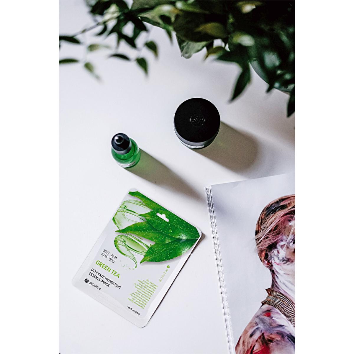 jkosmec hydrating green tea face mask, green tea mask packaging, applying green tea mask on face JKosmec Hydrating Green Tea Face Mask - Moisturizing & Toner for All Skin Types | 25 ml JKosmec Hydrating Green Tea Mask jkosmec, face-mask, green-tea, moisturizing, skincare, hydrating, soothing, pore-tightening, all-skin-types, ai-generated
