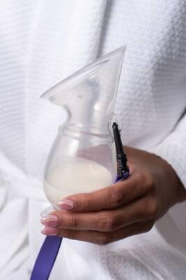 Lansinoh Silicone Breast Milk Collector & Saver: Hands-Free Leak Catcher for Effortless Breastfeeding & Pumping Lansinoh Breast Milk Collector: Save Milk & More! breast milk collector, silicone breast pump, milk saver, breastfeeding milk collector, leak catcher, portable breast milk collector, hands free breast milk collection, breast milk, breastfeeding, pumping, milk collection, milk storage, new mom, baby essentials, baby feeding, silicone, hands-free, portable, neck lanyard, lid, breast milk saver, Lans