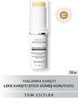Institut Esthederm Photo Reverse Sunscreen Stick SPF50+: Best Dark Spot Protection, Transparent Finish, Face, Lips, and Eyes, Anti-Aging Institut Esthederm SPF50+ Sunscreen Stick: Dark Spot Protection sunscreen stick SPF50, anti dark spot sunscreen, hyperpigmentation sunscreen, face sunscreen stick, transparent sunscreen stick, spf50 for face, sun protection stick for dark spots, leke karşıtı güneş kremi, photo reverse sunscreen, sunscreen göz çevresi dudak, sunscreen, sun protection, anti-aging, dark spot