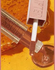 Maybelline Lifter Gloss: Honey Maple Hydrating Lip Gloss - Natural Warm Tone, Plumping Hyaluronic Acid Shine, Non-Sticky Formula Maybelline Lifter Gloss: Honey Maple Lip Gloss - Hydrating Shine lip gloss, moisturizing lip gloss, honey maple lip gloss, hyaluronic acid lip gloss, non-sticky lip gloss, warm tone lip gloss, Maybelline lip gloss, plumping lip gloss, hydrating lip gloss, natural lip gloss, lip care, beauty, cosmetics, shimmer, shine, honey maple, hyaluronic acid, moisturizing, non-sticky, warm to