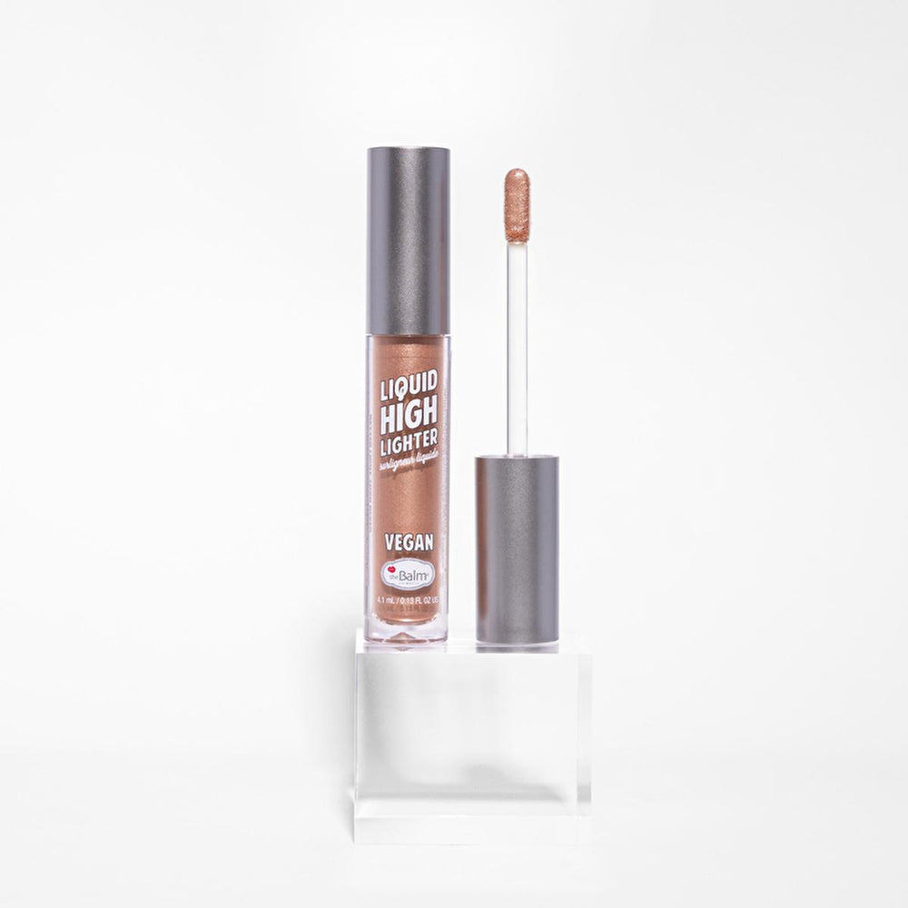 theBalm Likit Highlighter: Achieve Radiant, Luminous Skin with this Blendable & Buildable Liquid Illuminating Makeup theBalm Likit Highlighter: Radiant Glow | Liquid Illuminating Makeup Liquid Highlighter, theBalm Highlighter, Illuminating Makeup, Organic Highlighter, Jojoba Oil Highlighter, Radiant Skin Makeup, Buildable Highlighter, Blendable Highlighter, Makeup, Cosmetics, Beauty, Skin Care, Shimmer, Glow, Face Makeup, Women's Makeup, Highlighting, Luminous Skin, Natural Glow, Moisturizing, Hydrating, Ea