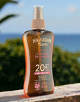 Hawaiian Tropic Glowing Protection SPF20 Sunscreen Oil: Tan & Moisturize with UVA/UVB Protection Hawaiian Tropic SPF20 Sunscreen Oil: Tan & Protect sunscreen oil, SPF20 sunscreen, Hawaiian Tropic sunscreen, vegan sunscreen, bronzing sunscreen oil, water resistant sunscreen, sun protection oil, UVA UVB protection sunscreen, sun protection, tanning oil, tanning, coconut oil, aloe vera, tropical flower extracts, moisturizing sunscreen, non-greasy sunscreen, water resistant, vegan, recycled packaging, eco-frien