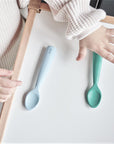 OiOi Mama Baby Spoon - Soft Silicone, Safe Feeding, Develops Fine Motor Skills OiOi Mama Baby Spoon - Safe & Gentle Feeding baby spoon, silicone baby spoon, safe baby utensils, gentle baby feeding, fine motor skills development, food grade silicone baby products, Turkish made baby spoon, baby feeding essentials, baby gift ideas, newborn baby products