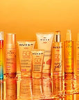 Nuxe Sun Eau Delicieuse Parfumante Body Spray - Tropical Summer Scent with Coconut & Tiare Flower | 30ml Nuxe Sun Body Spray: Tropical Coconut Summer Beach Scent Nuxe Sun fragrance, body spray, summer scent, tropical fragrance, coconut body mist, natural body spray, eau delicieuse parfumante, tiare flower perfume, sun inspired fragrance, beach scent, Nuxe, body mist, perfume, fragrance, tropical, coconut, tiare flower, natural, summer, beach, sweet orange, petitgrain, vanilla, musk, women's fragrance, light