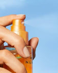 Nuxe Sun: UV Protection Moisturizing Hair Oil - Water Resistant Beach & Summer Hair Care, Protects from Sun, Salt & Chlorine - 3.38 fl oz Nuxe Sun Hair Oil - UV Protection, Moisturizing for Beach & Summer hair oil, sun protection hair, moisturizing hair oil, UV protection hair spray, water resistant hair protection, beach hair protection, summer hair care, Nuxe Sun hair oil, hair sunscreen, chlorine protection hair, hair care, UV protection, moisturizing, water-resistant, lightweight, summer fragrance, dual
