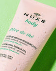 Nuxe Body Reve De The Revitalising Shower Gel - Natural, Energizing Fragrance & Gentle Skincare Nuxe Revitalising Shower Gel - Natural & Energizing Nuxe Body Reve De The Revitalising Shower Gel, Revitalising Shower Gel, Natural Shower Gel, Energizing Fragrance Shower Gel, Gentle Skincare Products, Natural Skincare, Refreshing Shower Gel, Green Tea Fragrance, Rhubarb Scent, Glycerin, Camellia Sinensis Flower Extract, Skincare for Sensitive Skin