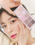 rom&nd Dreamy Lilac Garden Eyeshadow Palette: Create Stunning Eye Looks with Matte & Shimmer Shades, High Pigment Korean Eye Makeup rom&nd Dreamy Lilac Eyeshadow: Korean Palette, Matte & Shimmer rom&nd eyeshadow palette, Korean eyeshadow palette, matte shimmer eyeshadow, long lasting eyeshadow, eye makeup palette, Dreamy Lilac Garden eyeshadow, high pigment eyeshadow, blendable eyeshadow, eyeshadow, eye shadow, eye makeup, makeup, cosmetics, beauty, lilac eyeshadow, purple eyeshadow, Korean beauty, K-beauty