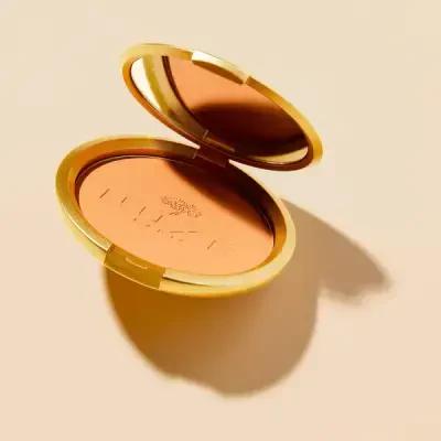 Nuxe Bronzing Compact Powder: Achieve a Radiant Sun-Kissed Glow - Natural Ingredients, Multi-Purpose Face & Body Bronzer, Non-Comedogenic Nuxe Bronzer: Radiant, Sun-Kissed Glow - Natural Ingredients bronzing powder, compact bronzer, natural bronzer, jasmine bronzer, face bronzer, body bronzer, Nuxe bronzer, non-comedogenic bronzer, bronzing powder for all skin types, radiant bronzing powder, bronzer, compact powder, natural cosmetics, jasmine flower, face makeup, body makeup, sun-kissed glow, healthy glow,