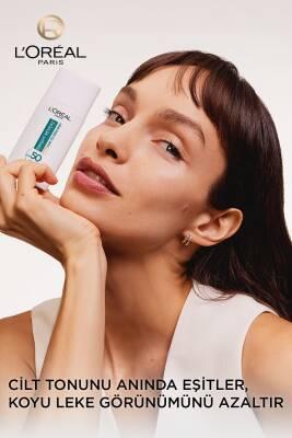 L'Oreal Paris Bright Reveal SPF 50 Tinted Sunscreen: Dark Spot Correcting, Light Coverage, Face Sun Protection L'Oreal Tinted SPF 50 Sunscreen: Dark Spot Corrector, Light Coverage SPF 50 sunscreen, Tinted sunscreen, Dark spot corrector, Light skin sunscreen, Skin tone evening sunscreen, Niacinamide sunscreen, Sun protection for face, Loreal sunscreen, Bright Reveal sunscreen, Sunscreen for hyperpigmentation, sunscreen, sun protection, skin care, face sunscreen, tinted moisturizer, dark spot treatment, even