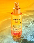 Nuxe Sun: UV Protection Moisturizing Hair Oil - Water Resistant Beach & Summer Hair Care, Protects from Sun, Salt & Chlorine - 3.38 fl oz Nuxe Sun Hair Oil - UV Protection, Moisturizing for Beach & Summer hair oil, sun protection hair, moisturizing hair oil, UV protection hair spray, water resistant hair protection, beach hair protection, summer hair care, Nuxe Sun hair oil, hair sunscreen, chlorine protection hair, hair care, UV protection, moisturizing, water-resistant, lightweight, summer fragrance, dual