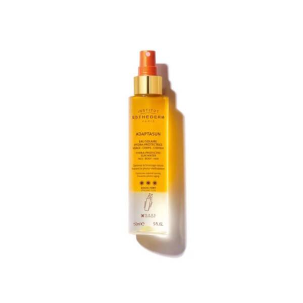 Esthederm Adaptasun Hydra-Protective Sun Water - 5.07 fl oz Sunscreen for Face, Body & Hair Esthederm Sunscreen - Hydrating Sun Protection sunscreen, hydrating sun protection, face and body sunscreen, anti-aging sun care, natural tan enhancement, sun care, skincare, moisturizing sunscreen, UV protection, photo-aging prevention, water-based sunscreen, versatile sun protection, daily sun care, outdoor protection, Esthederm