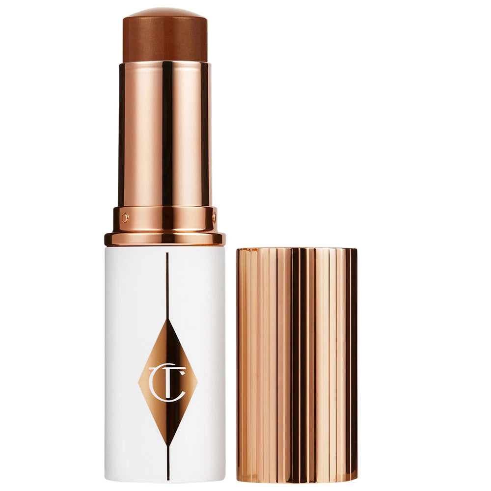 Unreal Skin Sheer Glow Tint Hydrating Foundation Stick - Natural, Vegan, Gluten-Free Makeup Unreal Skin Hydrating Foundation Stick - Natural & Vegan Makeup Hydrating Foundation Stick, Natural Makeup, Vegan Foundation, Gluten-Free Makeup, Cruelty-Free Cosmetics, Light Coverage Foundation, Skincare Makeup, Easy Makeup Application, On-the-Go Makeup, Second-Skin Finish, Multi-Molecular Weight Hyaluronic Acid, Vitamin E, Daikon Radish Seed Oil, Makeup for Sensitive Skin, Long-Lasting Makeup, Moisturizing Foundat
