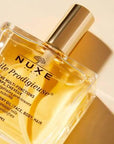 Nuxe Huile Prodigieuse Multi-purpose Dry Care Oil for Skin and Hair - Natural Skincare & Haircare Nuxe Huile Prodigieuse - Natural Skincare & Haircare Oil Nuxe Huile Prodigieuse, Multi-purpose dry care oil, Natural skincare, Haircare oil, Hypoallergenic beauty products, Skincare for dry skin, Haircare for dry hair, Natural beauty products, Dermatologically tested products, Skincare oil, Hair oil, Luxurious skincare, Luxurious haircare, Botanical skincare, Botanical haircare