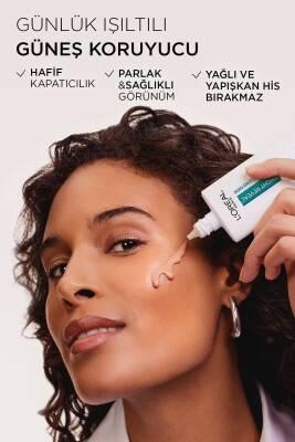 L'Oreal Paris Bright Reveal Tinted Sunscreen Fluid SPF 50 - Dark Spot Corrector, Evens Skin Tone, Medium Tint, Daily Sun Protection L'Oreal Tinted Sunscreen SPF 50: Dark Spot Corrector & Protection tinted sunscreen, SPF 50 sunscreen, dark spot corrector, skin brightening sunscreen, sunscreen with niacinamide, medium tinted sunscreen, Loreal sunscreen, sun protection for dark spots, daily sunscreen fluid, sunscreen, SPF 50, dark spot treatment, skin brightening, niacinamide, medium tint, sun protection, dail