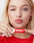 Nivea Nourishing Lip Care Balm with 24-hour Moisturization - Mineral Oil-Free Lip Balm Nivea 24-Hour Moisturizing Lip Balm - Mineral Oil-Free lip balm, nourishing lip care, 24-hour moisturization, dermatologically tested lip balm, mineral oil-free lip care, lip moisturizer, natural lip balm, shine lip balm, everyday lip care, healthy lip appearance, Nivea lip care