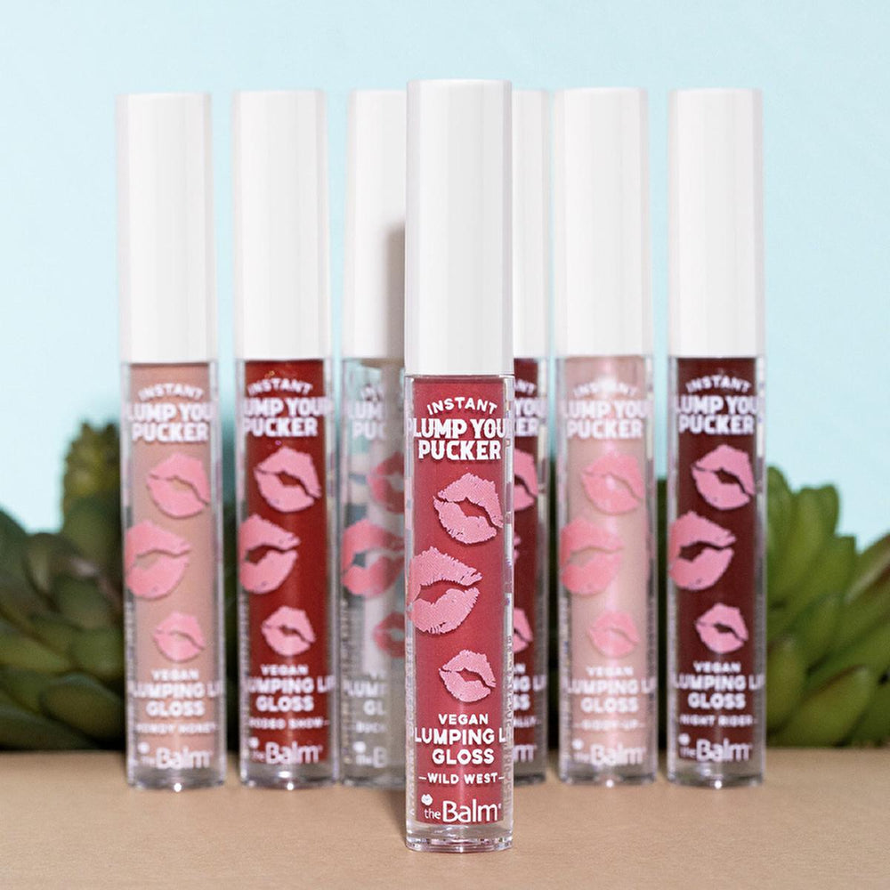 theBalm Instant Plump Your Pucker Lip Plumper Gloss: Get Fuller, Hydrated Lips with Organic Jojoba & Avocado Oil - Non-Sticky Formula, 5 Colors! theBalm Lip Plumper Gloss: Get Fuller Lips with Jojoba & Avocado Oil lip plumper, lip gloss, plumping lip gloss, organic lip gloss, moisturizing lip gloss, non-sticky lip gloss, theBalm lip gloss, volume lip gloss, natural lip plumper, fuller lips gloss, lip enhancement, lip care, jojoba oil, avocado oil, hydrating lip gloss, beauty, makeup, cosmetic, lip volume, l