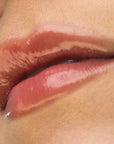 theBalm Instant Plump Your Pucker Lip Plumper Gloss: Get Fuller, Hydrated Lips with Organic Jojoba & Avocado Oil - Non-Sticky Formula, 5 Colors! theBalm Lip Plumper Gloss: Get Fuller Lips with Jojoba & Avocado Oil lip plumper, lip gloss, plumping lip gloss, organic lip gloss, moisturizing lip gloss, non-sticky lip gloss, theBalm lip gloss, volume lip gloss, natural lip plumper, fuller lips gloss, lip enhancement, lip care, jojoba oil, avocado oil, hydrating lip gloss, beauty, makeup, cosmetic, lip volume, l