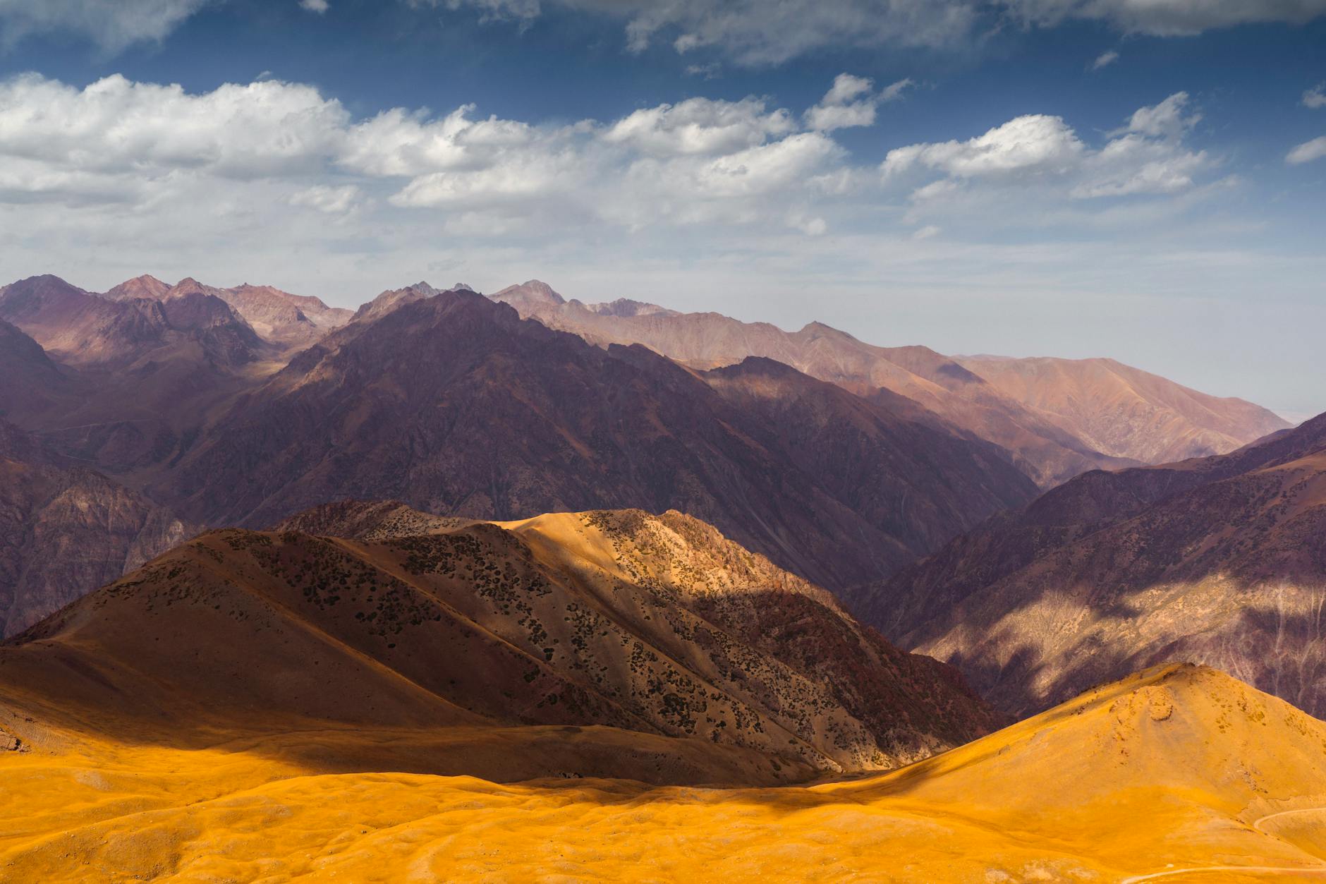 Scenic view of the Ala-Too mountain range in Kyrgyzstan showcasing vibrant landscapes.