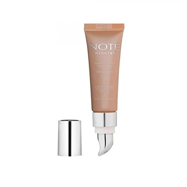Note Mineral Eye Concealer 203: Brightening Dark Circle Eraser with Cooling Metal Tip & SPF 15 Note Mineral Eye Concealer: SPF 15 Dark Circle Eraser mineral eye concealer, dark circle concealer, brightening eye concealer, SPF 15 concealer, Vitamin E concealer, cooling metal tip concealer, Note Cosmetics concealer, eye concealer for dark circles, concealer for fine lines, eye concealer, concealer, dark circles, fine lines, blemishes, mineral makeup, vitamin E, SPF protection, cooling effect, puffiness, sensi