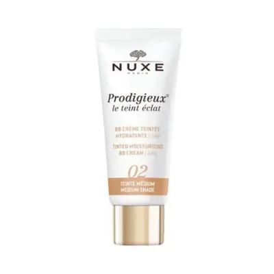 nuxe tinted moisturizing bb cream 30ml medium, nuxe prodigieux bb cream product packaging, nuxe tinted moisturizer applied on skin Nuxe Tinted Moisturizing BB Cream - 02 Medium | 30 ml Nuxe Tinted Moisturizing BB Cream - 02 Medium nuxe, bb-cream, tinted-moisturizer, 30ml, medium, hydration, skincare, beauty, makeup, ai-generated