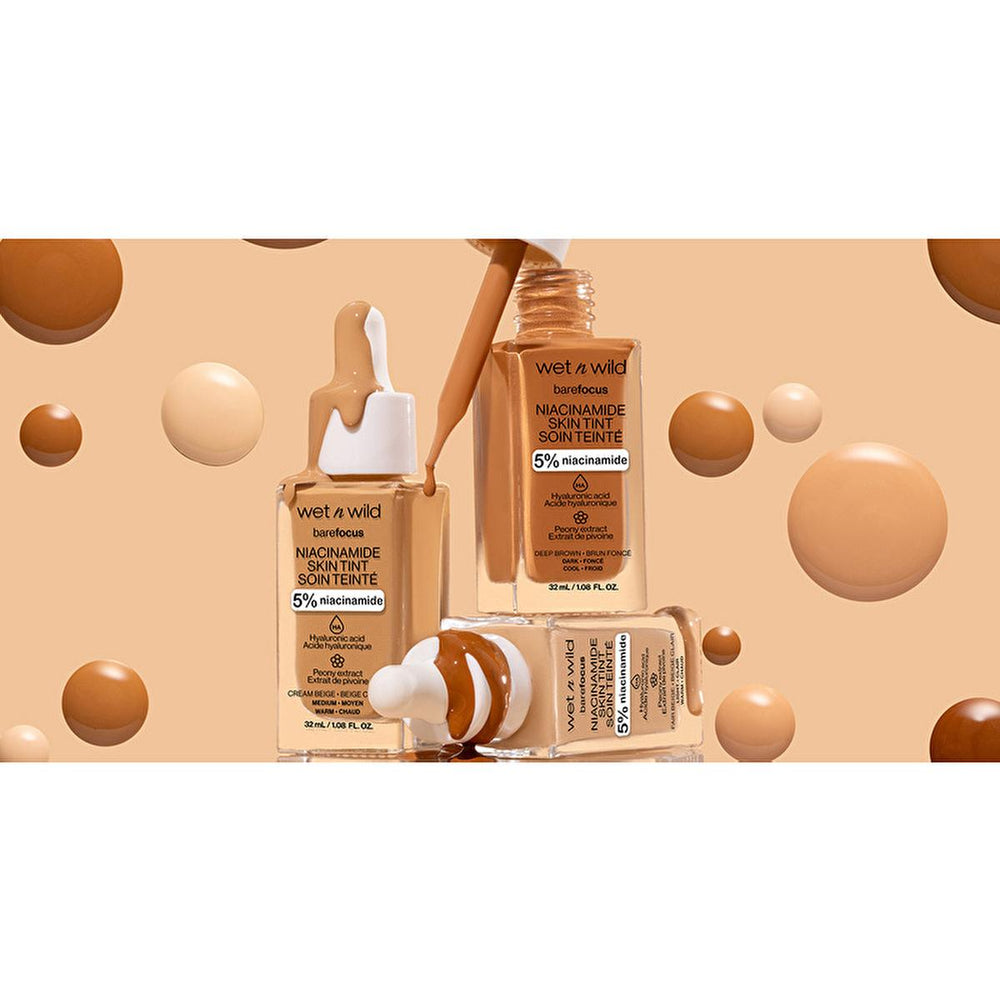 wet n wild Niacinamide Skin Tint Foundation: Achieve Natural, Radiant Skin with Hyaluronic Acid & Sheer Coverage wet n wild: Niacinamide Skin Tint Foundation - Natural Coverage Niacinamide skin tint, Hyaluronic acid foundation, Sheer coverage foundation, Satin finish foundation, Lightweight skin tint, wet n wild foundation, Skincare infused makeup, Foundation for sensitive skin, skin tint, foundation, makeup, niacinamide, hyaluronic acid, peony extract, sheer coverage, satin finish, lightweight, natural loo