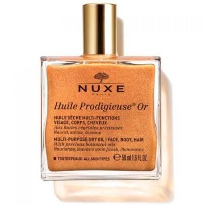 nuxe huile prodigieuse or shimmering dry oil 50 ml bottle, nuxe huile prodigieuse oil application on skin, nuxe huile prodigieuse oil glitter effect Nuxe Huile Prodigieuse Or - Shimmering Dry Oil | 50 ml Nuxe Huile Prodigieuse Or - Shimmering Dry Oil | 50 ml nuxe, shimmering-oil, dry-oil, body-care, facial-oil, hair-oil, natural-beauty, luxury-skincare, moisturizing-oil, ai-generated