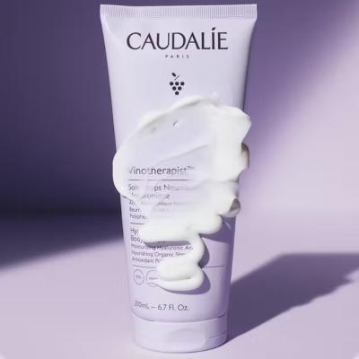 caudalie hyaluronic body lotion 200 ml, nourishing body lotion for dry skin, lightweight and fast-absorbing lotion Caudalie Hyaluronic Body Lotion - Nourishing Formula | 200 ml Caudalie Hyaluronic Body Lotion - Nourishing Formula | 200 ml caudalie, body-lotion, hyaluronic-acid, hydrating-lotion, vegan, skincare, moisturizer, nourishing, shea-butter, ai-generated