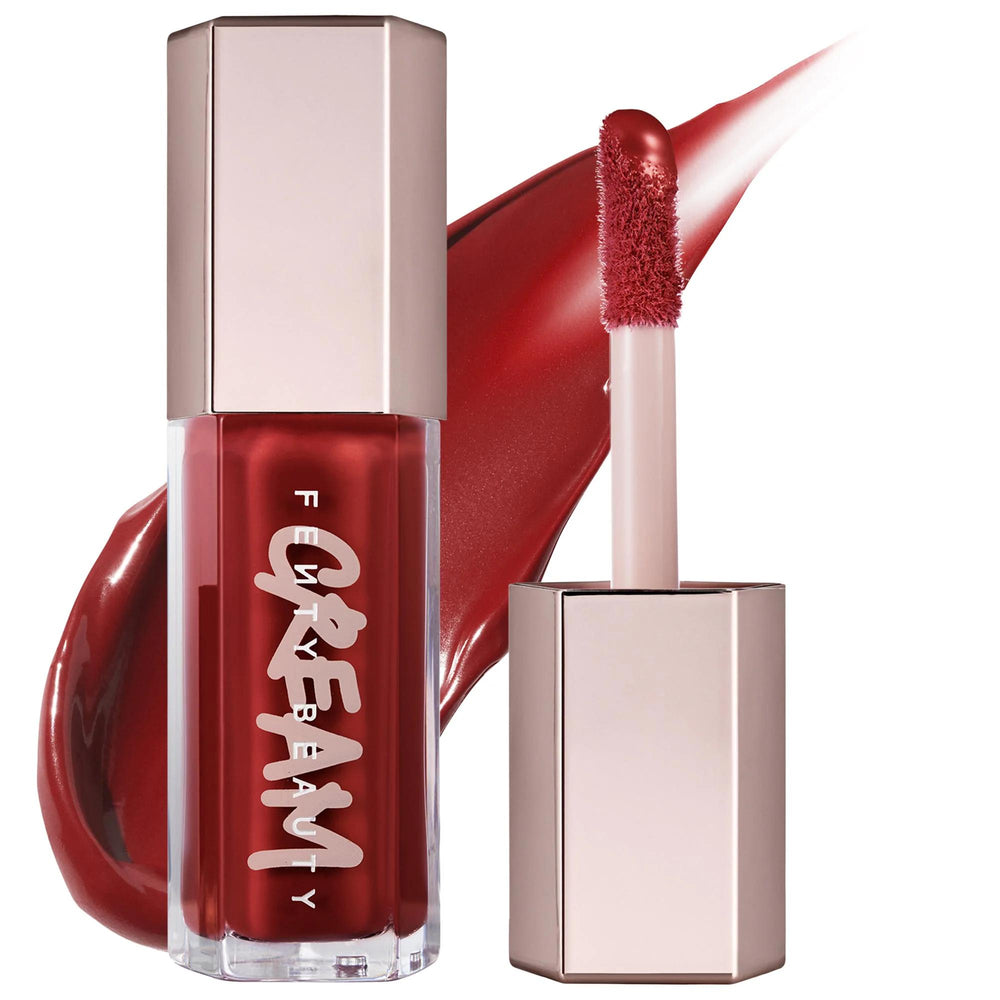 Fenty Beauty Gloss Bomb Cream: High-Shine, Full Coverage Lip Cream - Non-Sticky, Vitamin A Infused for Hydrated, Voluminous Lips Fenty Beauty Gloss Bomb Cream: High Shine & Hydration lip cream, creamy lip gloss, high shine lip color, non-sticky lip gloss, vitamin A lip treatment, peach vanilla lip gloss, full coverage lip cream, cruelty-free lip gloss, gluten-free lip gloss, lip gloss, lip color, hydrating lip cream, moisturizing lip gloss, makeup, beauty, Fenty Beauty, Rihanna, lip care, cosmetic, high shi