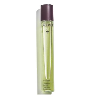 caudalie vinosculpt body oil packaging, applying caudalie vinosculpt body oil on skin, close-up of caudalie vinosculpt body oil bottle, caudalie vinosculpt essential oils ingredients Caudalie Vinosculpt Body Oil - Slimming & Anti-Cellulite | 75 ml Caudalie Vinosculpt Body Oil - Slimming & Anti-Cellulite caudalie, body-oil, slimming, anti-cellulite, vegan, clean-beauty, essential-oils, natural-ingredients, skin-care, ai-generated