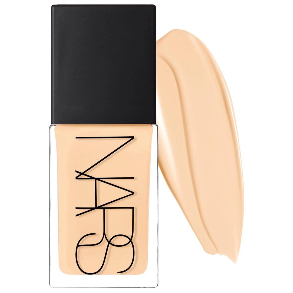 Drunk Elephant Light Reflecting Advanced Skincare Medium Coverage Foundation - Natural Finish, Vegan, Clean Beauty Drunk Elephant Foundation - Natural Finish, Vegan & Clean makeup skincare hybrid foundation, natural finish foundation, medium coverage foundation, vegan foundation, clean beauty foundation, Drunk Elephant, skincare benefits, sensitive skin friendly, eco-friendly packaging, recyclable packaging, natural finish, liquid foundation, biomimetic oat, Japanese lilyturf, cacao peptides, milk thistle, 