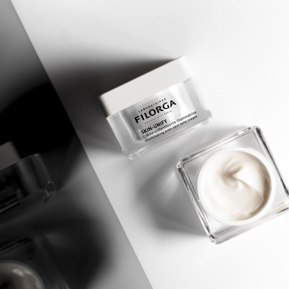 Filorga Skin-Unify Cream: Brightening & Tone Evening - Vitamin C, Hyaluronic Acid - Radiant, Anti-Aging Skin Treatment Filorga Skin-Unify: Brightening Cream for Even Skin Tone skin brightening cream, skin tone evening cream, pigmentation spot treatment, hyperpigmentation cream, radiant skin cream, vitamin c skin care, Filorga Skin-Unify, dark spot corrector, anti-aging cream, skin discoloration treatment, vitamin C, glabridin, algae extract, hyaluronic acid, anti-oxidant peptides, uneven skin tone, pigmenta