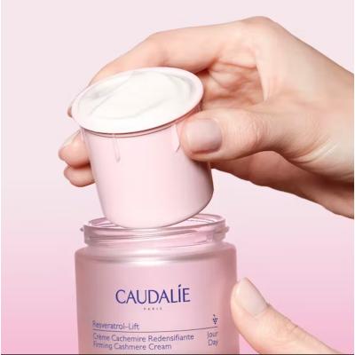 Caudalie Resveratrol-lift Anti-aging Day Cream with Firming Properties - 50 ml Refillable Caudalie Resveratrol-lift Anti-aging Day Cream - Firm & Hydrate Anti-aging day cream, Firming skincare, Resveratrol skincare products, Caudalie Resveratrol-lift, Day care cream with firming properties, Skincare for aging skin, Firming day cream, Refillable skincare, Sustainable beauty products, Anti-aging skincare routine, Daily hydration cream, Antioxidant skincare