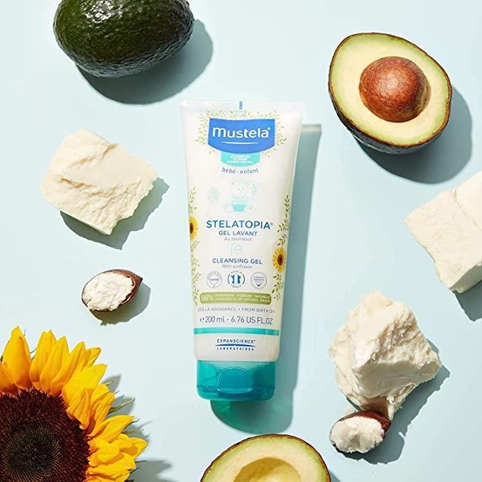 Mustela Stelatopia: Gentle Baby Cleansing Gel & Shampoo for Very Dry, Sensitive Skin - Natural, Vegan, & Hypoallergenic - 6.76 fl oz Mustela Stelatopia Baby Cleansing Gel - Dry & Sensitive Skin Mustela Stelatopia Cleansing Gel, baby cleansing gel, baby shampoo for dry skin, natural baby skincare, vegan baby wash, hypoallergenic baby wash, baby eczema wash, gentle baby cleanser, baby body wash for sensitive skin, dry skin baby bath products, baby wash, baby shampoo, dry skin, sensitive skin, eczema, natural 
