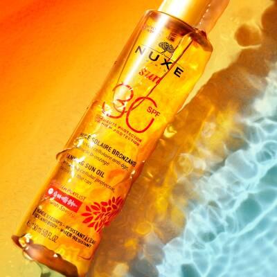 Nuxe Sun Tanning Oil SPF30: Protect & Bronze with Organic Oils & Vitamin E, Water-Resistant Sunscreen for Radiant Skin Nuxe Sun SPF30 Oil: Bronze & Protect with Organic Sunscreen sun tanning oil SPF30, sunscreen oil, bronzing oil, organic tanning oil, water resistant sunscreen, sun protection oil, Nuxe sun oil, tanning oil with vitamin E, paraben free tanning oil, sun tanning oil, sunscreen, bronzing, organic oil, water resistant, sun protection, Nuxe, vitamin E, paraben free, tanning, sun protection, summe