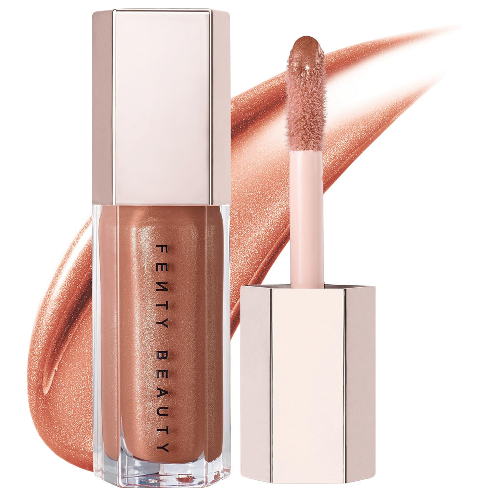 Fenty Beauty Gloss Bomb: Universal Lip Luminizer - High Shine, Non-Sticky, Moisturizing Lip Gloss for All Skin Tones Fenty Beauty Lip Gloss: High-Shine, Moisturizing, Universal Shade lip gloss, shining lip gloss, universal lip luminizer, non-sticky lip gloss, moisturizing lip gloss, cruelty-free lip gloss, peach vanilla lip gloss, lip gloss for all skin tones, high shine lip gloss, lip luminizer, hydrating lip gloss, gloss bomb, fenty beauty, rihanna, makeup, cosmetic, lip care, beauty products, gifts for h