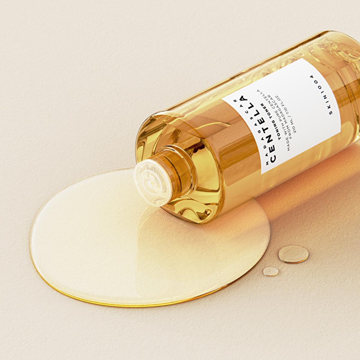 skin1004 madagascar centella toner bottle, application of skin1004 madagascar centella toner, skin1004 madagascar centella toner ingredients, skin1004 madagascar centella toner on a vanity Skin1004 Madagascar Centella Brightening Toner - Gentle Exfoliation for Sensitive Skin | 7.1 fl. oz. Skin1004 Madagascar Centella Toner - Brightening &amp; Gentle skin1004, centella-toner, sensitive-skin, brightening-toner, gentle-exfoliation, skincare, cica-extract, faced-care, toner, ai-generated