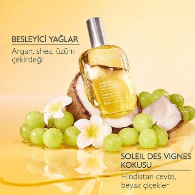 caudalie soleil des vignes elixir oil bottle, application of caudalie elixir oil on skin Caudalie Soleil des Vignes Elixir Oil - Nourishing | 50 ml Caudalie Soleil des Vignes Elixir Oil - Nourishing | 50 ml caudalie, body-oil, vegan, skincare, nourishing-oil, hydrating, summer-scent, non-greasy, natural-beauty, ai-generated