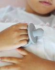 OiOi Baby Silicone Teether - Safe & Effective Teething Relief for Infants, Premium Food-Grade Silicone, Easy - Baby Care