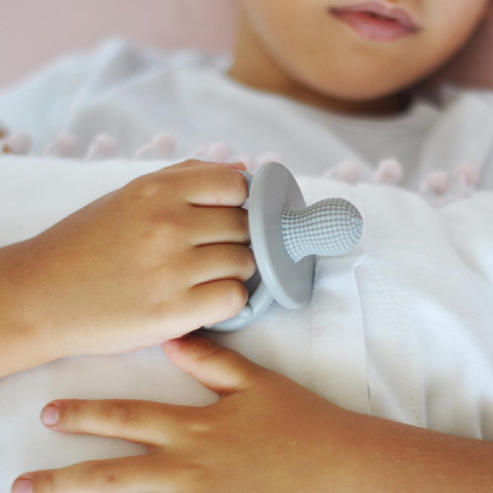 OiOi Baby Silicone Teether - Safe & Effective Teething Relief for Infants, Premium Food-Grade Silicone, Easy - Baby Care