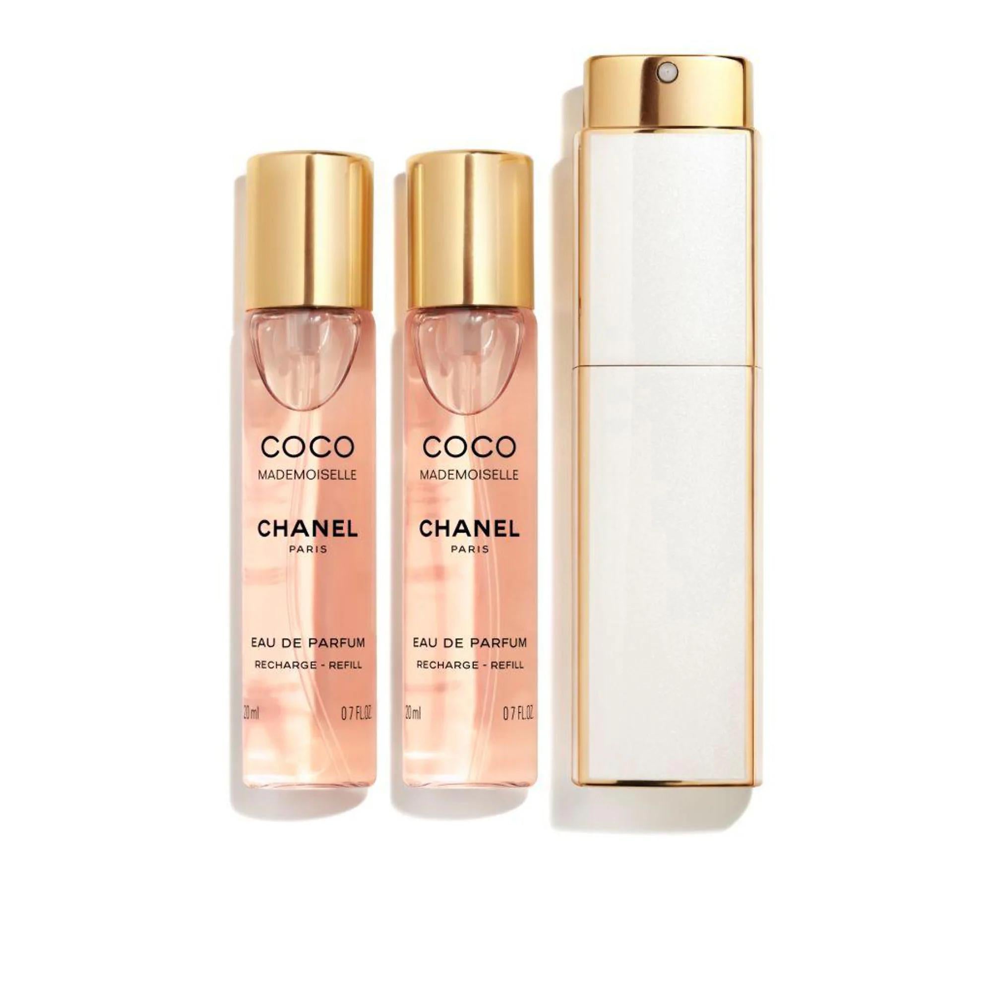 Chanel COCO MADEMOISELLE Eau de Parfum - Luxurious Floral Fragrance for Women Chanel COCO MADEMOISELLE Eau de Parfum - Luxury Floral Scent Coco Mademoiselle, Eau de Parfum, Floral fragrance, Luxury perfume, Chanel perfume, Women's perfume, Floral scent, Warm floral, Orange fragrance, Patchouli, Turkish Rose, Long-lasting fragrance, Seductive scent, Luxury fragrance, Women's fragrance, Perfume for women, Chanel fragrance