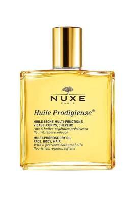 nuxe huile prodigieuse multipurpose dry oil 100ml, nuxe multipurpose dry oil in elegant packaging, nuxe huile prodigieuse application on skin and hair Nuxe Huile Prodigieuse - Multipurpose Dry Oil | 100ml Nuxe Huile Prodigieuse - Multipurpose Dry Oil 100ml nuxe, dry-oil, skincare, haircare, multipurpose, natural-beauty, vegan, non-paraben, luxurious-fragrance, ai-generated