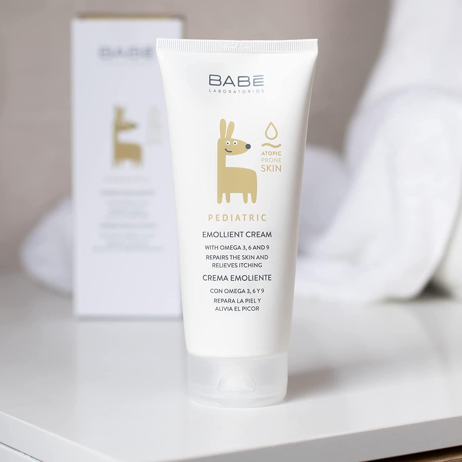 babe-pediatric-emollient-baby-cream-package, babe-pediatric-emollient-application, babe-pediatric-emollient-texture Babe Pediatric Emollient Baby Cream - 200 ml | Hypoallergenic Babe Pediatric Emollient Baby Cream - 6.76 Fl Oz babe, baby-cream, moisturizer, pediatric-skincare, sensitive-skin, eczema-care, parents, children, ai-generated, topical-cream