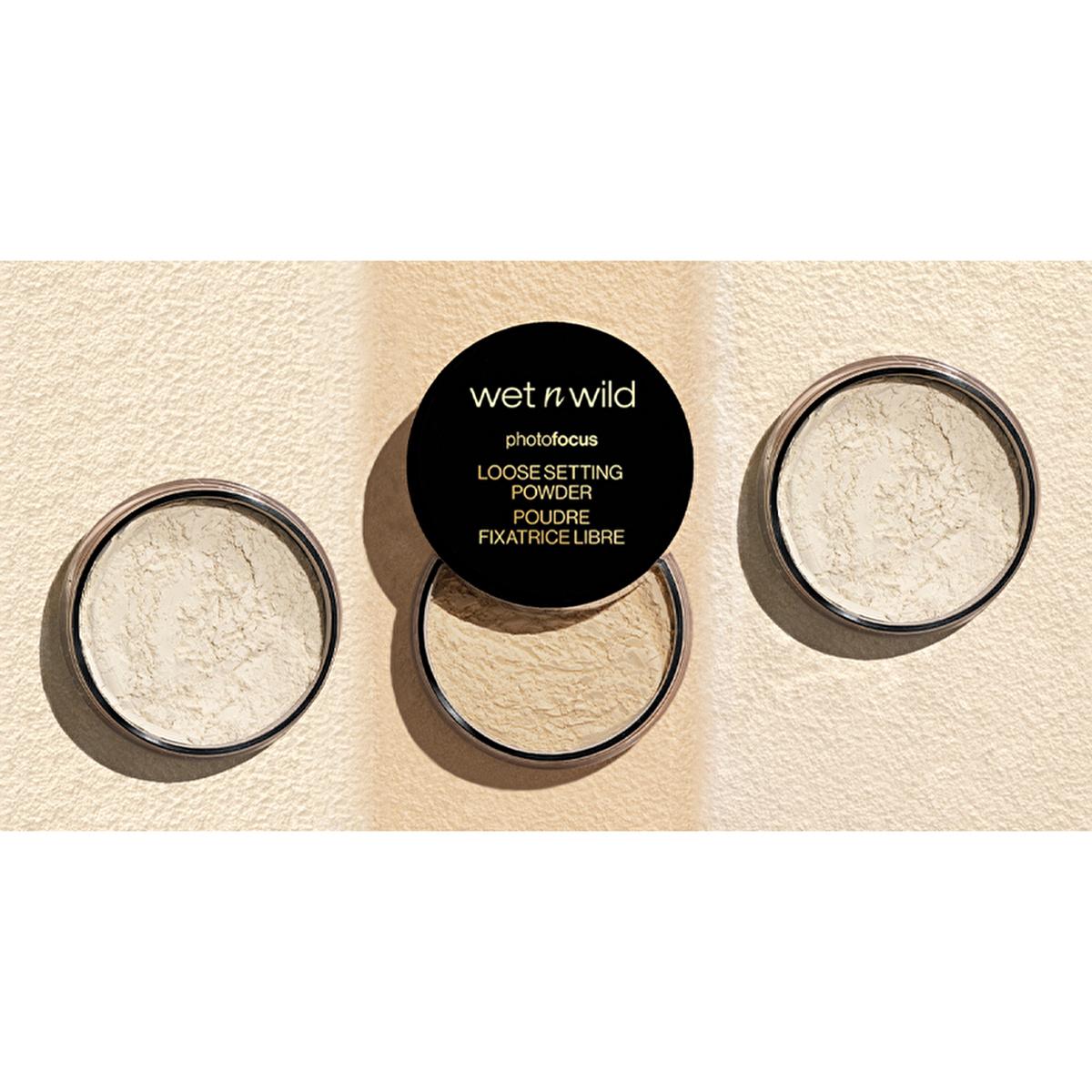 wet n wild photo focus loose setting powder translucent, wet n wild photo focus loose powder in packaging, application of wet n wild setting powder Wet n Wild Photo Focus Loose Setting Powder - Translucent for All Skin Types | 0.7 oz Wet n Wild Photo Focus Loose Setting Powder - Translucent loose-setting-powder, wet-n-wild, translucent-powder, makeup-setting, oil-absorbing, lightweight, baking-powder, cosmetic, photo-focus-powder, ai-generated