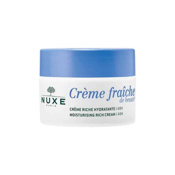 nuxe moisturising rich cream bottle, nuxe cream applied on skin Nuxe Moisturising Rich Cream - Ideal for Dry Skin | 50ml Nuxe Moisturising Rich Cream - 50ml nuxe, moisturiser, rich-cream, dry-skin, intense-hydration, skin-care, face-cream, luxury-skin-care, ai-generated, 50ml