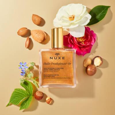 Nuxe Huile Prodigieuse Or: Golden Shimmer Dry Body &amp; Hair Oil for Radiant Skin - Natural, Multi-Purpose, Paraben-Free, Hydrating - 100 ml Nuxe Golden Shimmer Oil: Radiant Skin &amp; Hair Hydration Nuxe Huile Prodigieuse Or, Golden shimmer dry oil, Multi-purpose hair oil, Natural dry oil, Shimmer body oil, Hydrating hair oil, Paraben-free oil, Radiant skin oil, Golden glow oil, dry body oil, hair oil, shimmer oil, body oil, natural ingredients, paraben-free, vitamin E, moisturizer, radiant skin, glowing skin, hy
