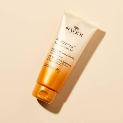 Nuxe Prodigieux Shower Oil: Golden Shimmer Body Cleansing Oil for Soft, Radiant Skin - 6.76 fl oz Nuxe Prodigieux Shower Oil: Shimmering Body Cleansing for Radiant Skin shower oil, golden shimmer shower oil, fragrant shower oil, gentle cleansing oil, Nuxe shower oil, body cleansing oil, moisturizing shower oil, shimmering body wash, body oil, cleansing oil, skincare, body care, golden shimmer, radiant skin, soft skin, luxurious shower, aromatherapeutic, daily cleansing, gentle cleanser, body wash, shimmer, 