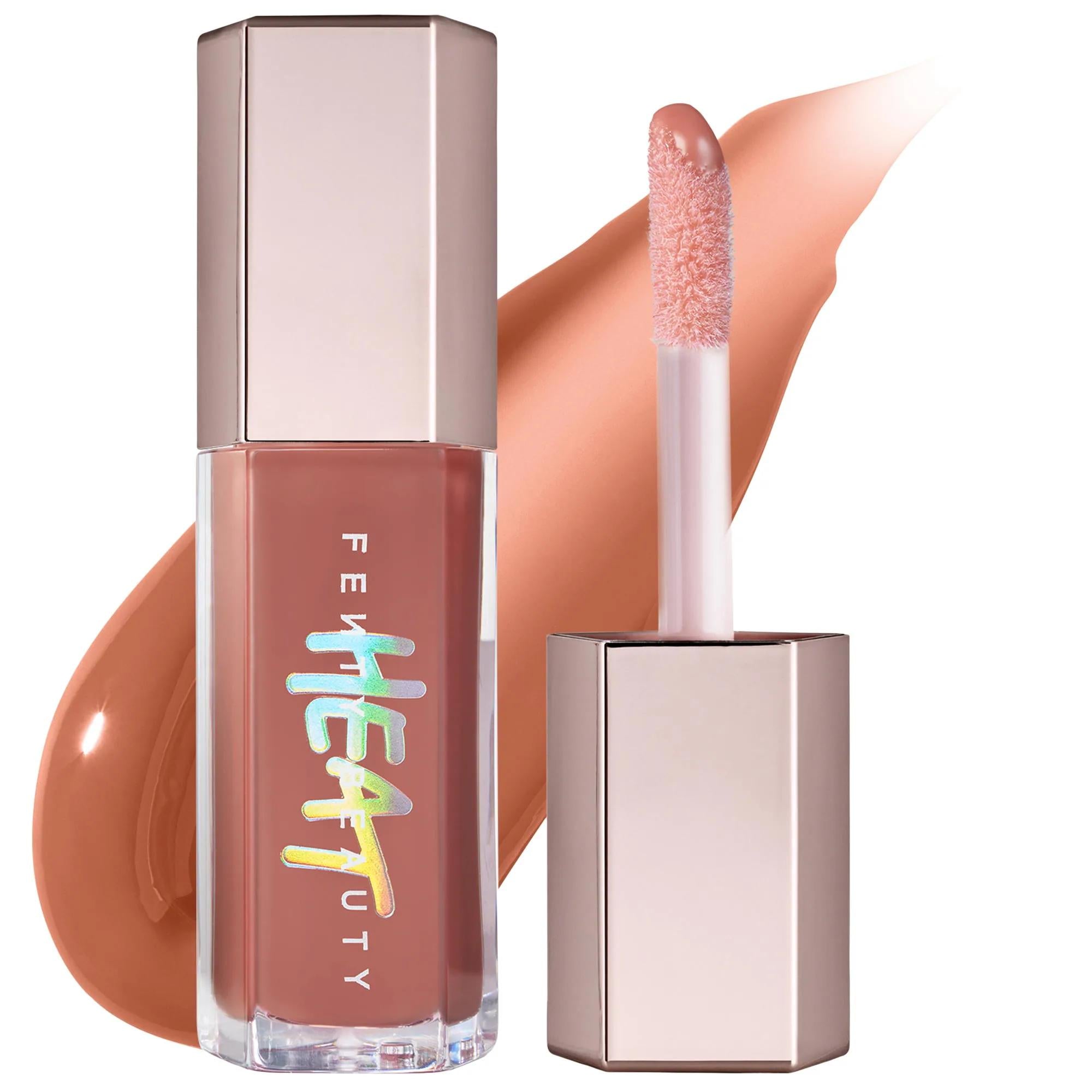 Fenty Beauty Gloss Bomb Heat: Plumping Lip Luminizer & Gloss, Fuller Lips, High Shine, Tinted - Cruelty-Free Lip Gloss Fenty Beauty Gloss Bomb Heat: Lip Plumper, Fuller Lips & Shine lip plumper, lip gloss, gloss bomb heat, lip luminizer, fuller lips gloss, shea butter lip gloss, vitamin E lip plumper, high shine lip gloss, tinted lip plumper, cruelty free lip gloss, lip care, beauty, cosmetics, lip enhancement, lip volume, glossy lips, tinted lip gloss, cruelty-free beauty, gifts for her, makeup, lip plump,