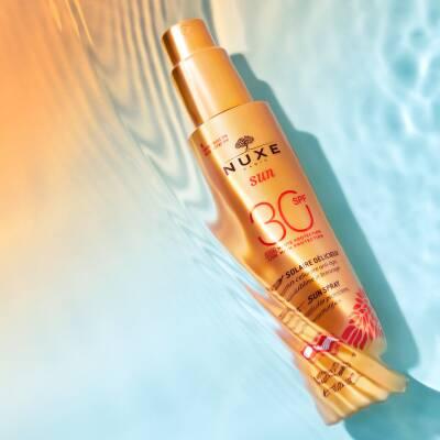 Nuxe Sunscreen Spray SPF30 - Anti-Aging, Moisturizing Sun Protection for Face & Body Nuxe SPF30 Sunscreen Spray - Anti-Aging Sun Protection sunscreen spray, SPF30 sun protection, anti-aging sun care, non-comedogenic sunscreen, moisturizing sun lotion, sun protection for face and body, anti-aging benefits, moisturizing properties, lightweight sun care, non-greasy sunscreen, outdoor activities, skincare, sunburn prevention, youthful skin, healthy skin, daily sun protection