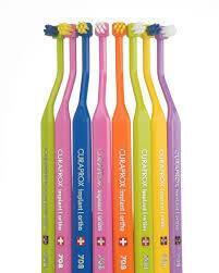 Curaprox CS 708: Gentle Implant & Orthodontic Toothbrush - Soft Bristles for Sensitive Gums & Effective Plaque Removal Curaprox Implant Toothbrush: Gentle Cleaning for Sensitive Gums implant toothbrush, orthodontic toothbrush, gentle toothbrush, sensitive gums toothbrush, Curaprox toothbrush, post-surgery toothbrush, braces toothbrush, dental implant care, orthodontic cleaning, soft bristle toothbrush, dental implants, orthodontics, sensitive gums, specialized dental care, soft bristles, small brush head, g